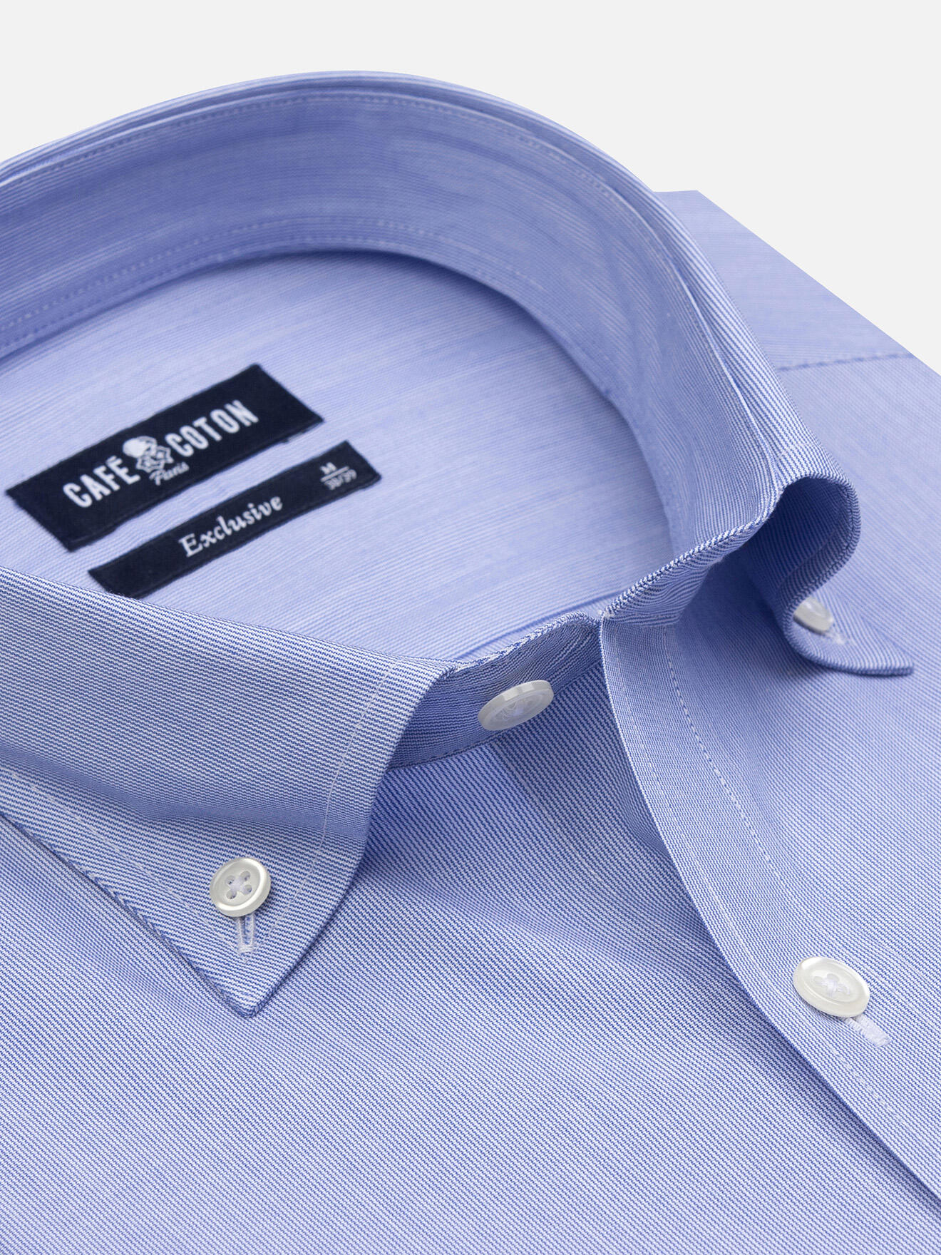 Chemise bleue milles raies col à boutons 